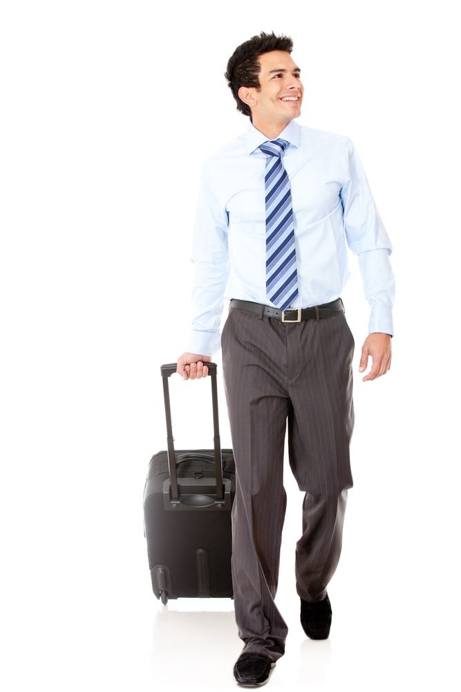 Man going on a business trip carrying bag - isolated over a white background