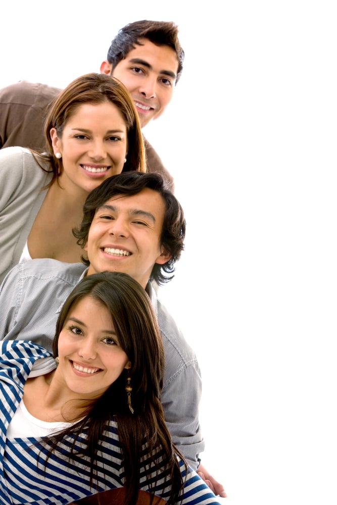 happy group of friends smiling isolated over a white background